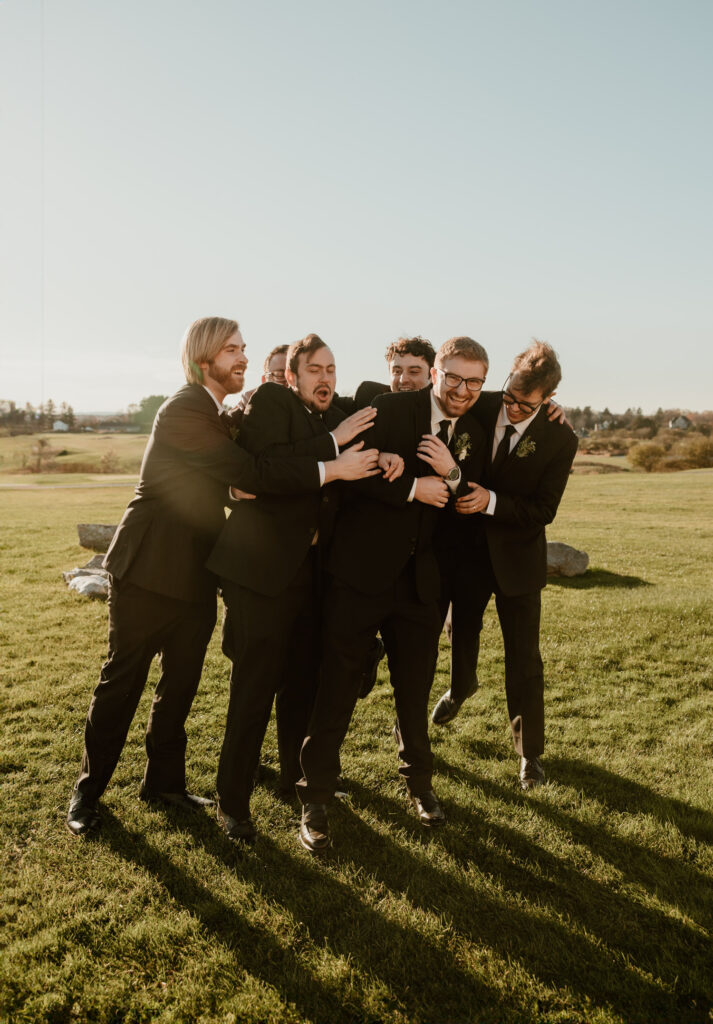 Groom with his groomsmen enjoying the moment at The Links at Union Vale.