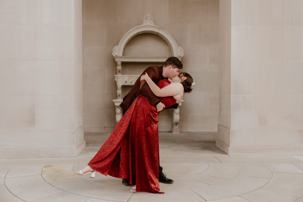 Romantic dip and kiss during an engagement session at Vanderbilt Mansion in Hyde Park, NY.